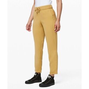 Lululemon On the Fly 7/8 Pant *Woven Vintage Gold